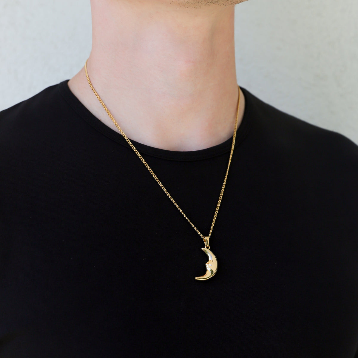 Gold crescent moon pendant necklace with slim chain and crescent charm