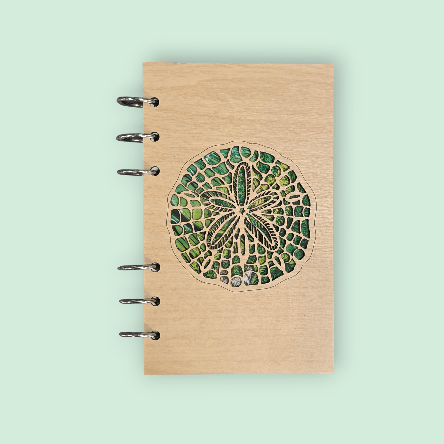 A6 refillable wood notebook journal with sand dollar design and metal binder rings on spine
