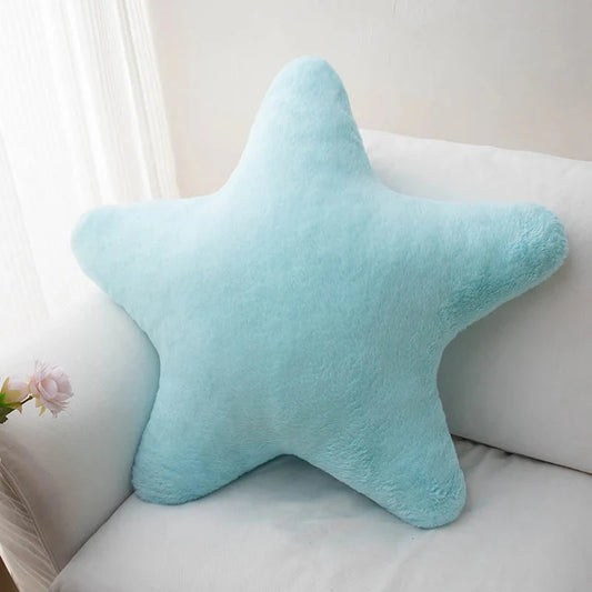 Blue star-shaped plush pillow, soft five-point cushion with rounded edges.