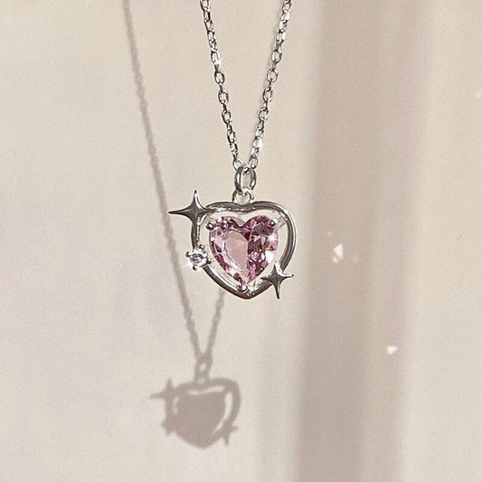 Heart crystal pendant necklace with silver-tone chain and pink faceted heart charm