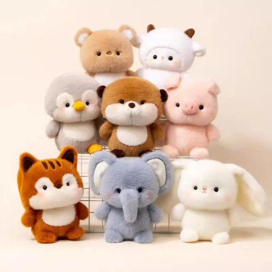 Set of plush animal desk companions: tiger, pig, bear, elephant, and penguin