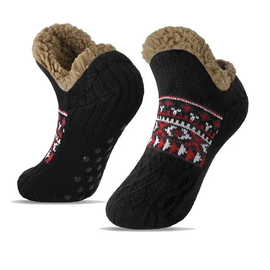 Black slipper socks with fuzzy cuffs, Fair Isle band, textured knit and grip dots