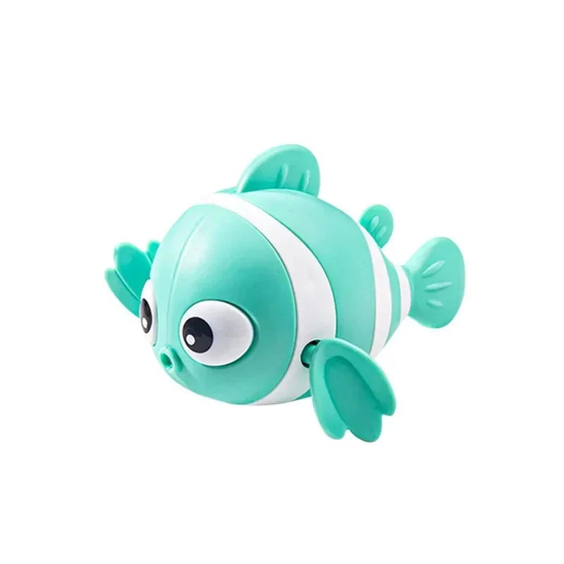 Teal clown fish bath toy with white stripe and round cartoon eyes.