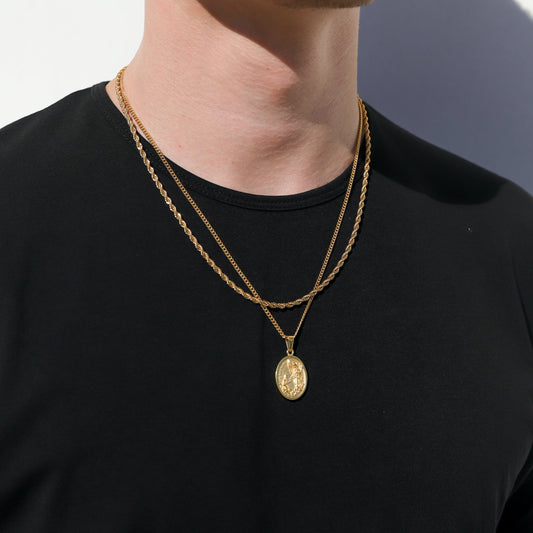 Gold rope chain with oval Saint Raphael pendant, layered neckline necklace