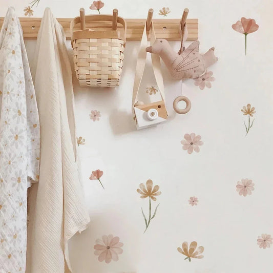 Boho flower wall decals with small pastel blossoms scattered on a light wall