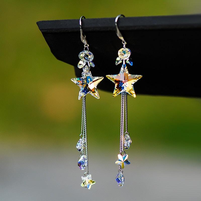Hanging star crystal earrings with blue-and-gold stars and small dangling drops