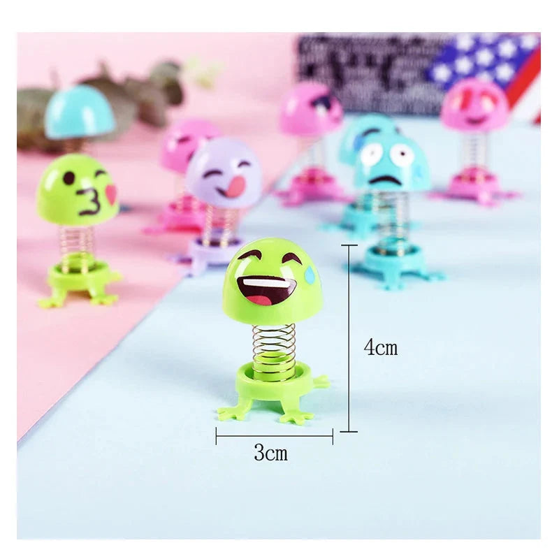 Spring elf toy with face sticker, green spring and star base, size dimensions shown