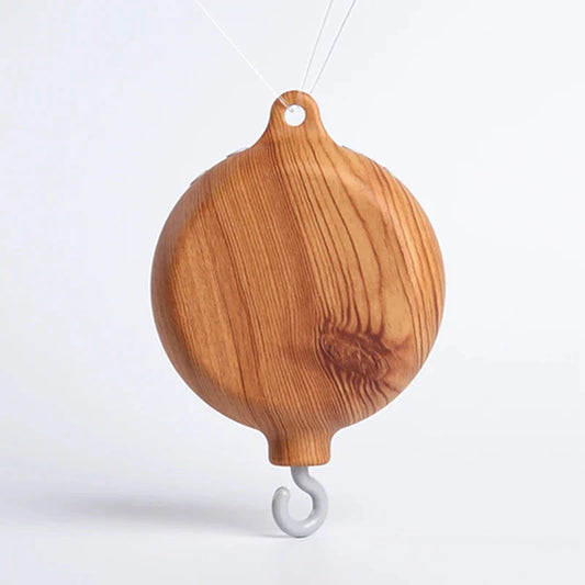 Wooden hanging whale music box toy with top loop and curved white hook
