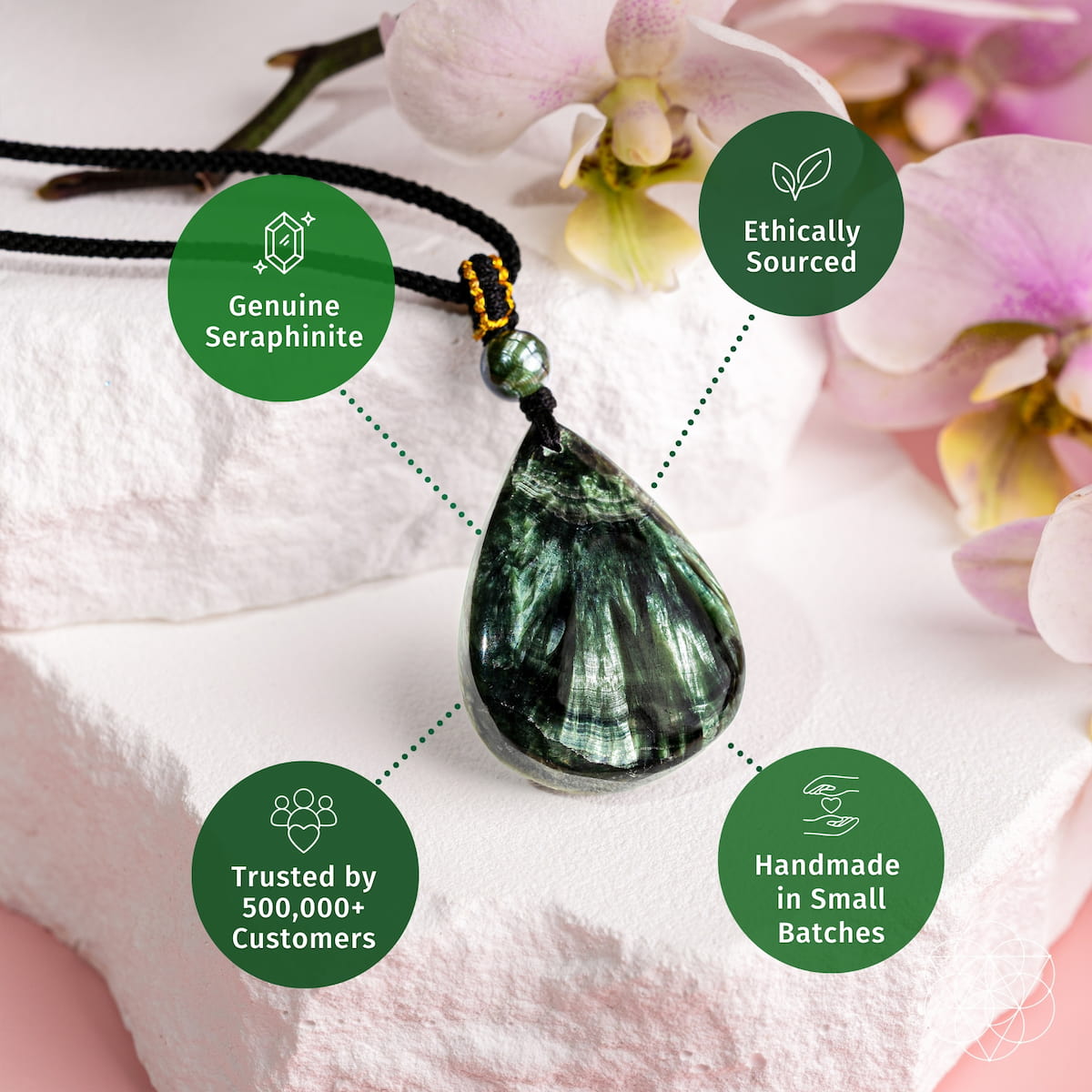 Green seraphinite teardrop pendant on black cord