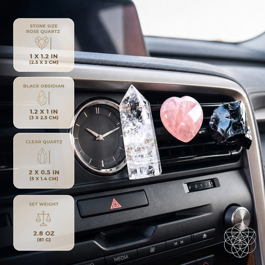 Car dashboard crystal kit: clear quartz tower, rose quartz heart, and black obsidian piece.
