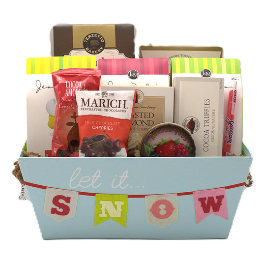 Winter gift basket in a blue box with 'let it...' banner and assorted chocolates