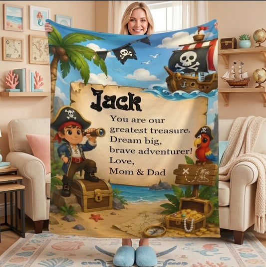 Kids pirate treasure throw blanket with Jack name, ship, skulls, and treasure map graphics