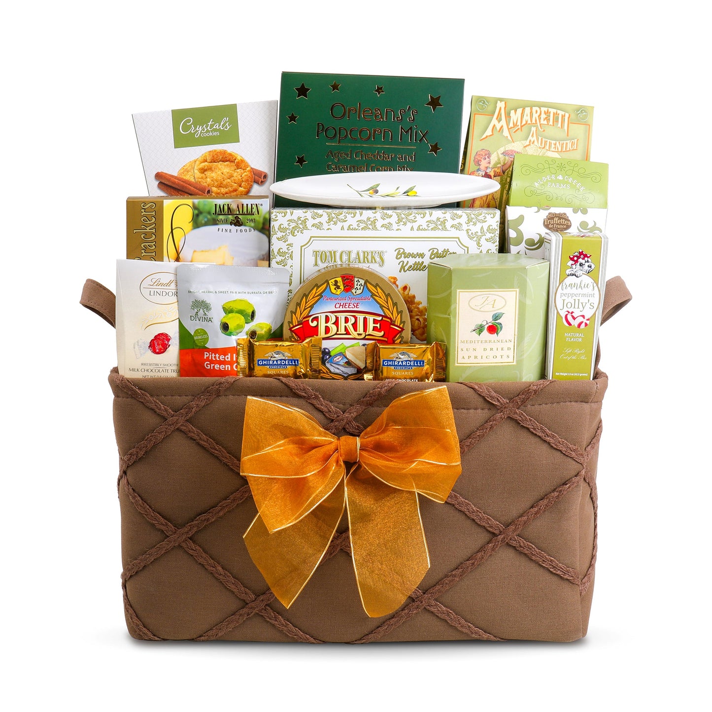 Savory gift basket wrapped in brown fabric with orange ribbon and assorted packaged snacks.