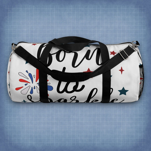 White duffel bag with black carry handles, “born to sparkle” print and star accents