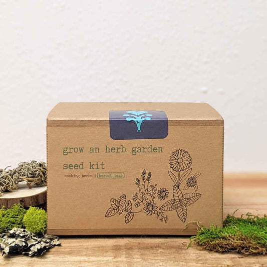 Grow an herb garden seed kit box with floral line art and tea graphic