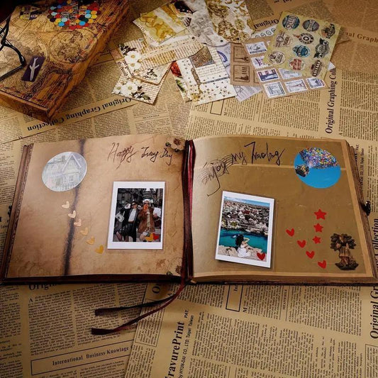Travel scrapbook photo album pages open with decorative photos, notes, and stickers