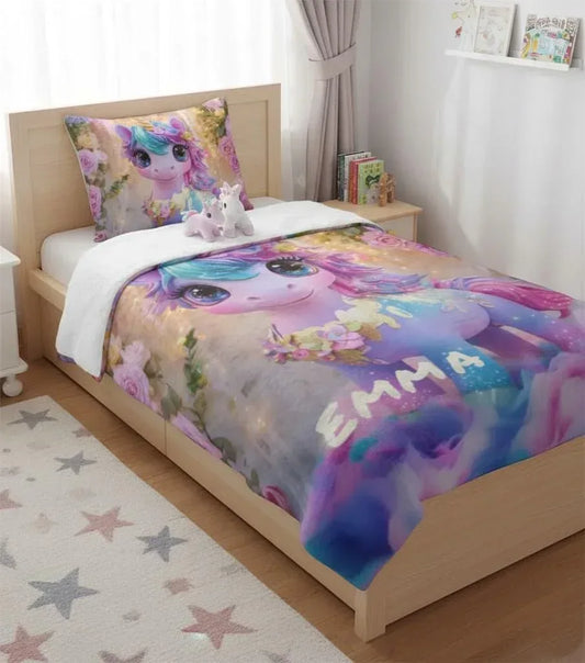 Unicorn flannel throw blanket on bed with pastel blue-purple unicorn print