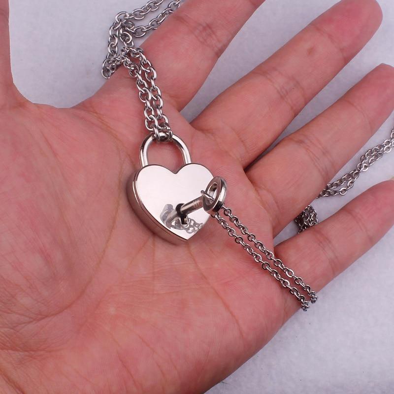 Heart padlock necklace on silver chain with key inside heart-shaped lock