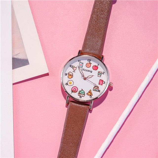 Kids wristwatch with round face, food-themed dial, and brown leather strap