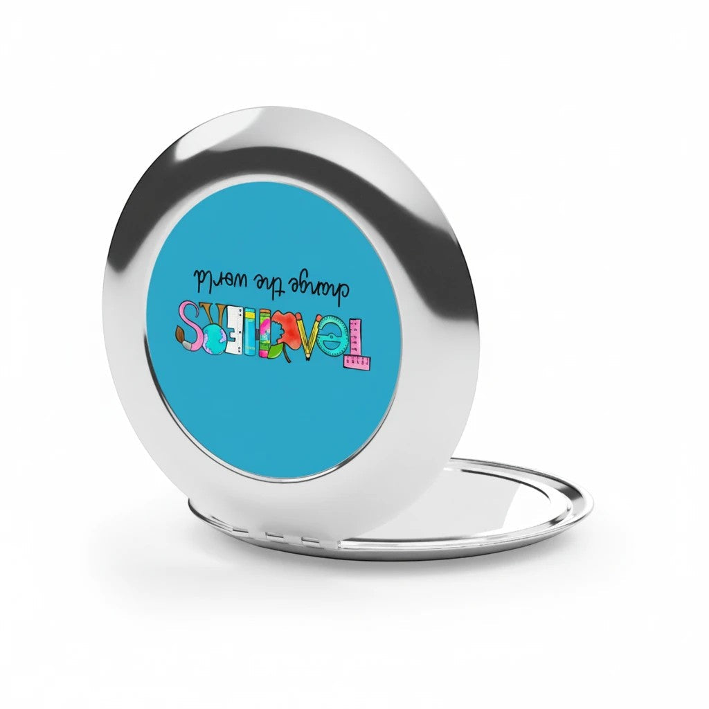 Silver glossy compact travel mirror open with blue Teachers graphic on the round cover