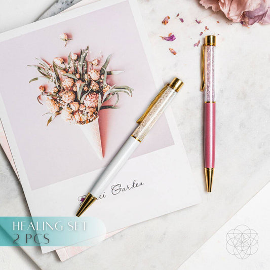 Healing set crystal pens: pink and gold pen plus a second pen with gold cap