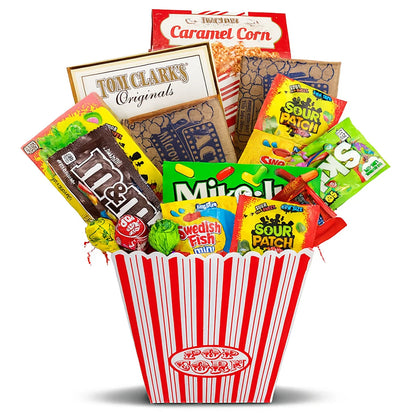 Gift basket with red striped tub, caramel corn bag, sour candy packs, and chocolate snack