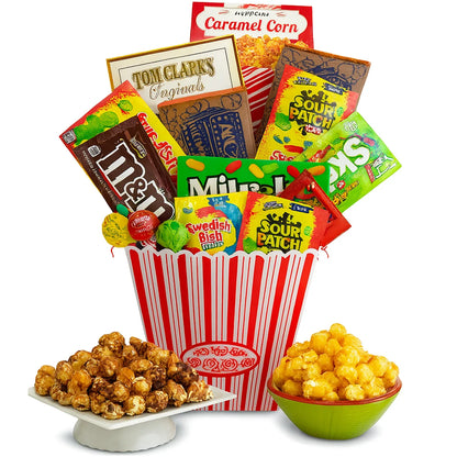 Movie night gift basket with red striped popcorn tub, caramel corn and assorted candy packs