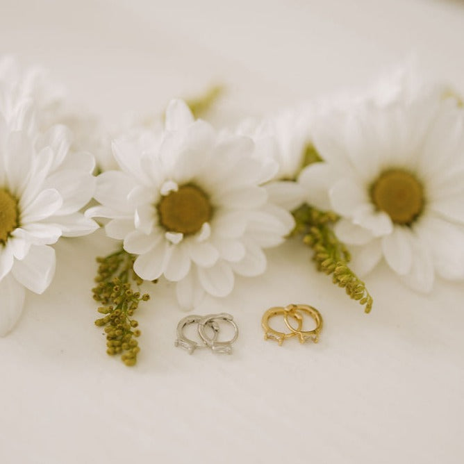 Gold and silver baguette diamond mini hoop earrings