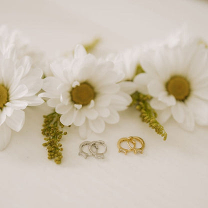 Gold and silver baguette diamond mini hoop earrings