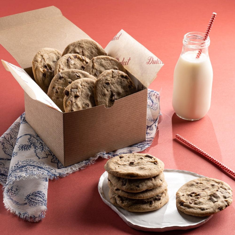 Chocolate chip cookie box with assorted cookies and a milk bottle