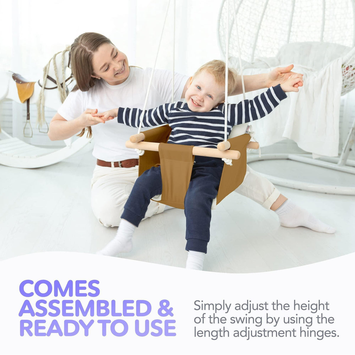 Canvas baby swing chair with tan seat, white cushions, and wooden support for babies