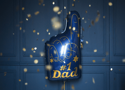 Blue “#1 Dad” foil balloon in the shape of a foam finger with star accents.