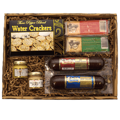 Hearty gourmet gift box with water crackers, cheese, sausage, and jars inside