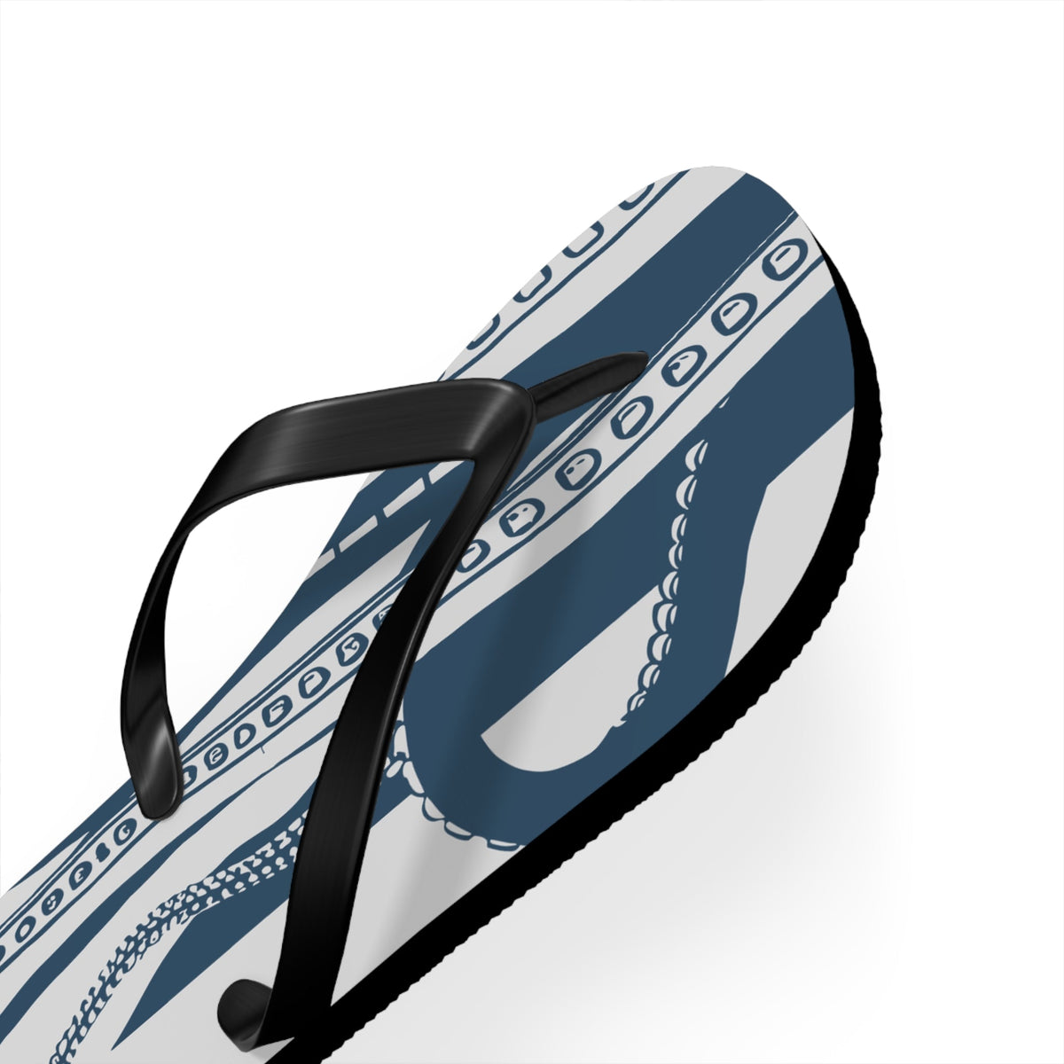 Side view of blue octopus print flip-flop with black thong strap