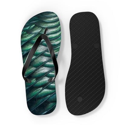 Front view pair of green scale-pattern flip-flops with black straps and black textured sole