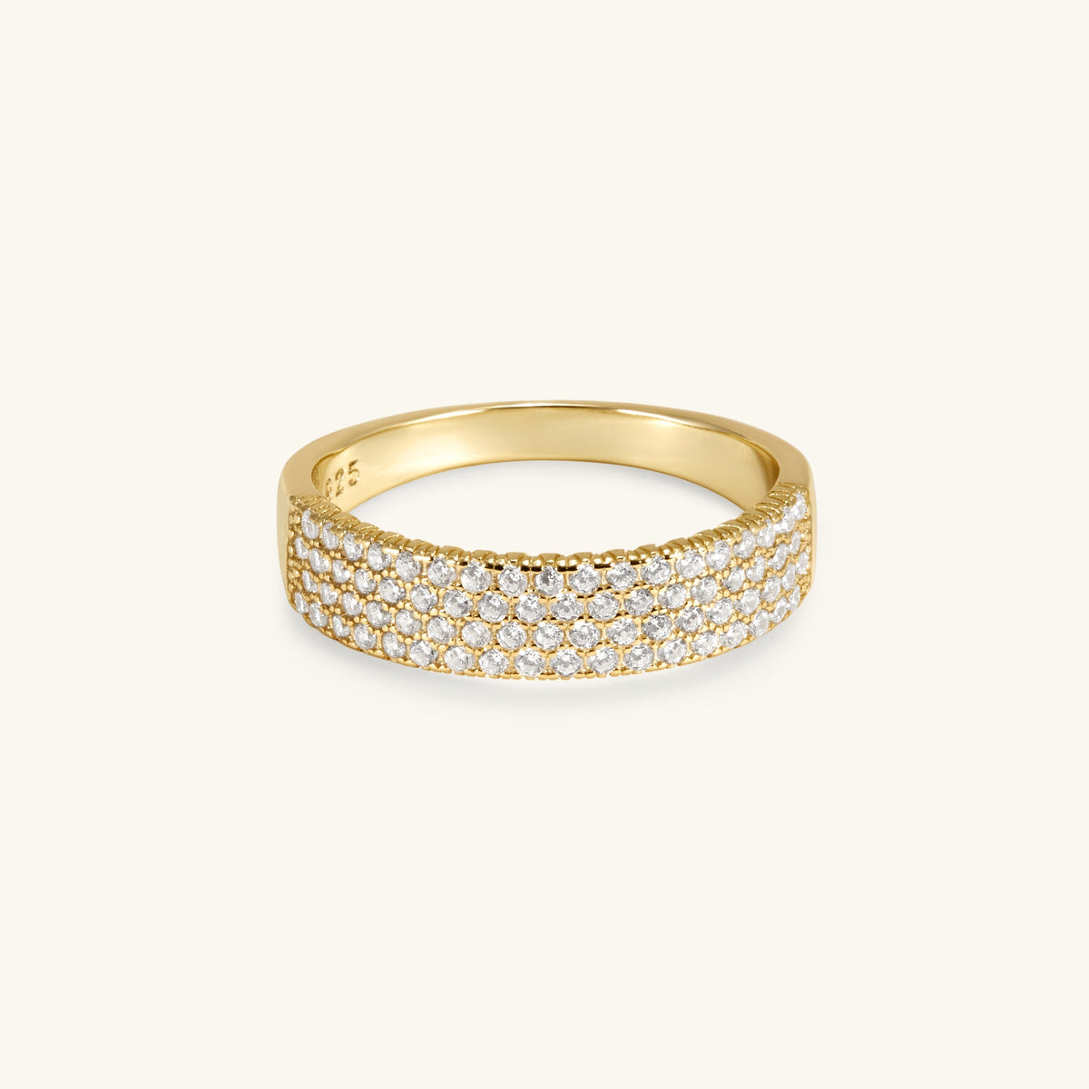 Pavé cigar band in gold with rows of clear stones