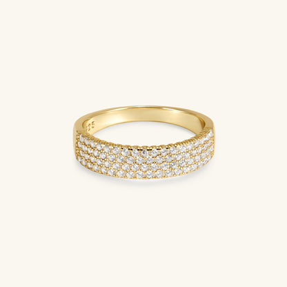Pavé cigar band in gold with rows of clear stones