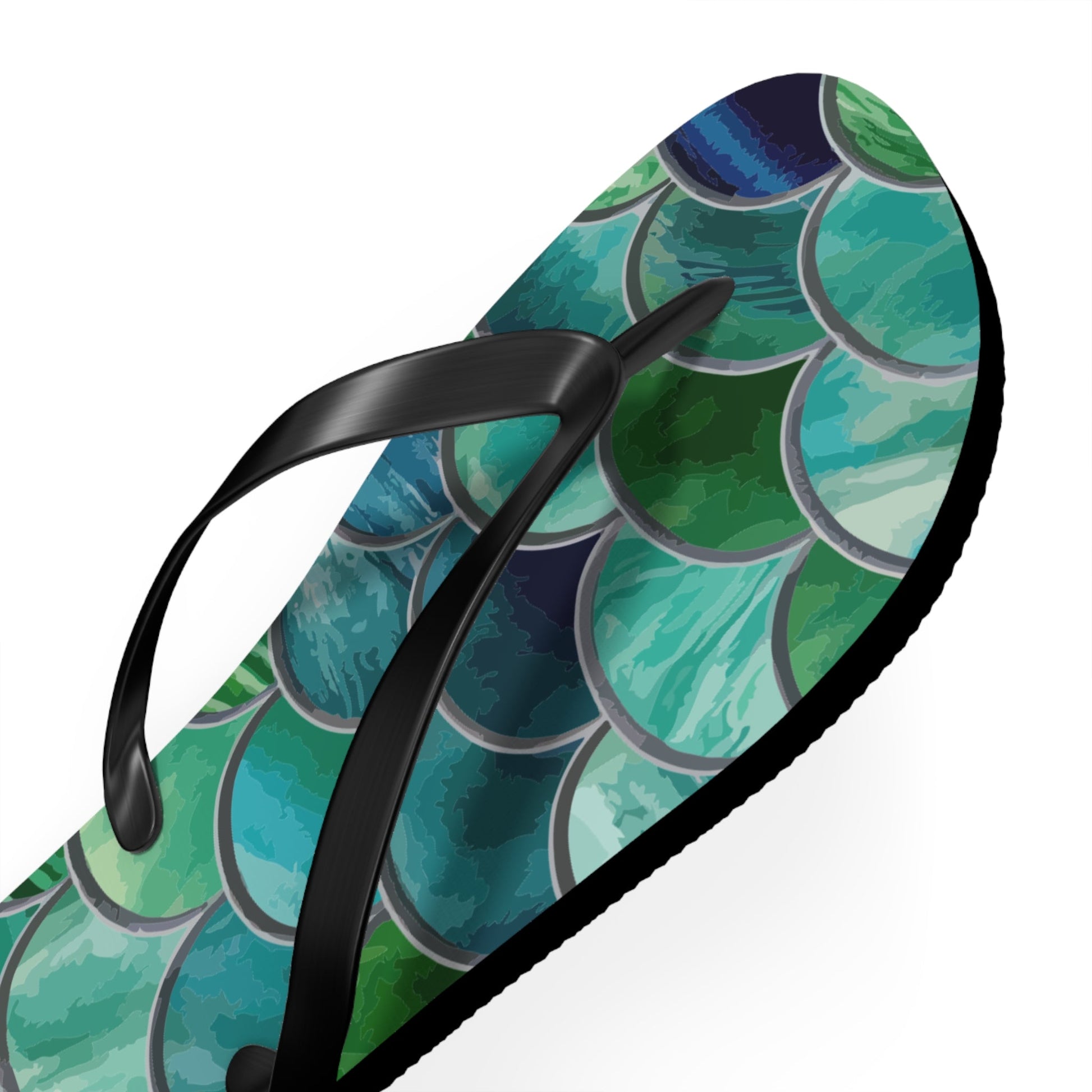 Mermaid-scale flip-flop with black thong strap and green-blue scaly pattern on the footbed