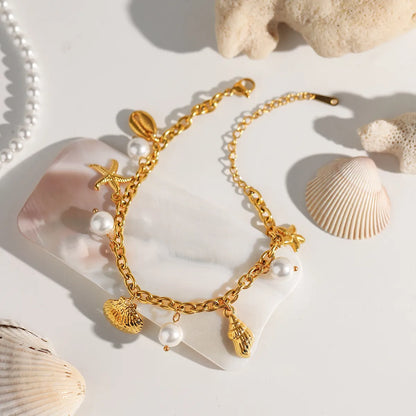 Gold Ocean Charm Bracelet – Starfish, Seashell, Seahorse & Pearl | 18K Gold Plated Stainless Steel | Adjustable 9.1" | Coastal Jewellery Gift for Her
