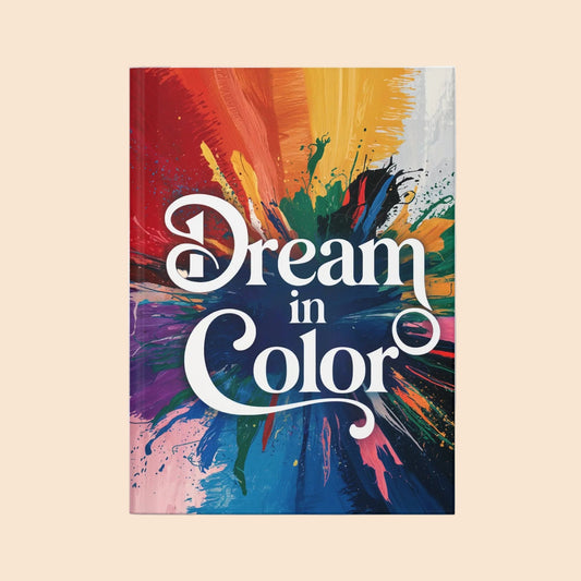 Hardcover journal with colorful paint-splash cover and "Dream in Color" title