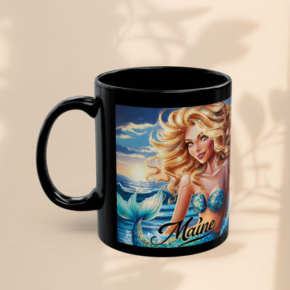 Black ceramic mug with mermaid illustration, blonde hair, and 'Maine' text