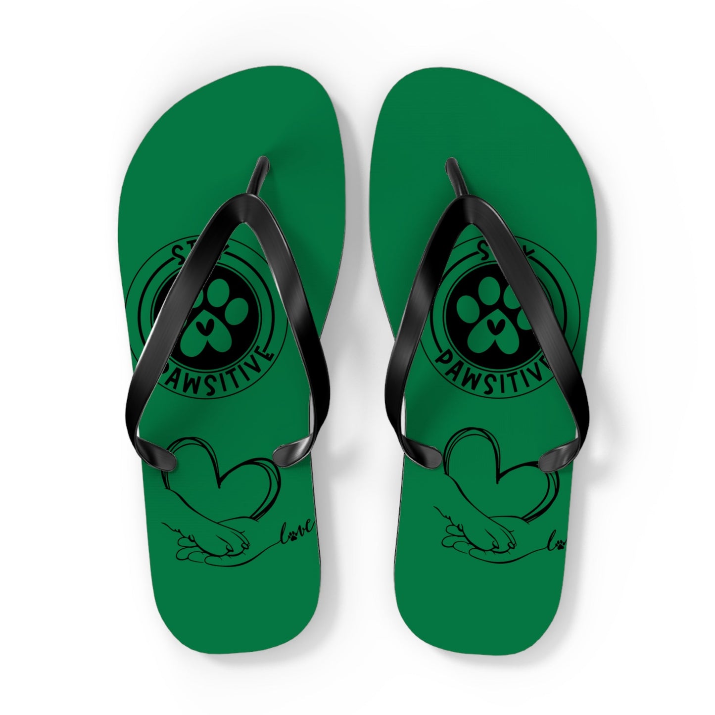 Green thong sandals with black straps and paw-print “PAWSITIVE” text on the upper