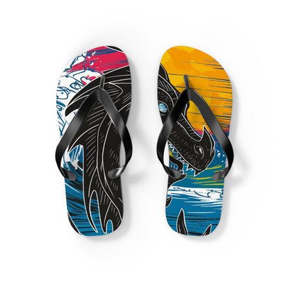 Pair of flip flops with dragon artwork on colorful footbeds and black straps.