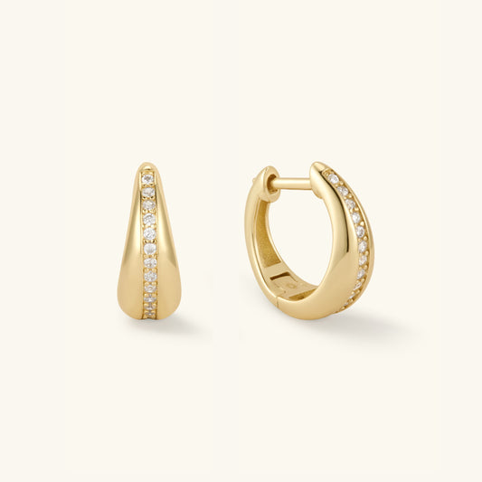 Gold teardrop huggie earrings with pavé diamond accents