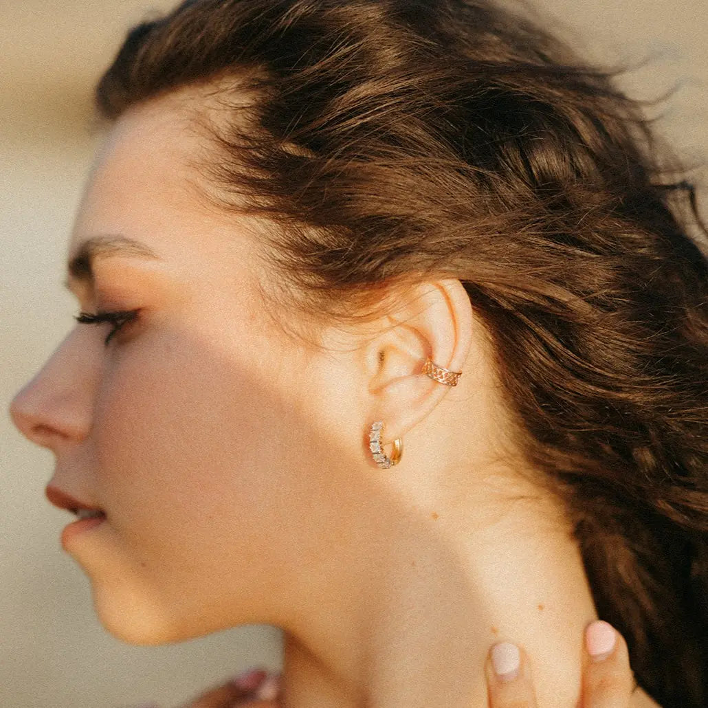Gold-filled diamond hoop earring worn with a small ear cuff