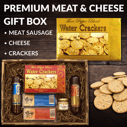 Meat and cheese gift box with water crackers, cheese, and sausage in a crate