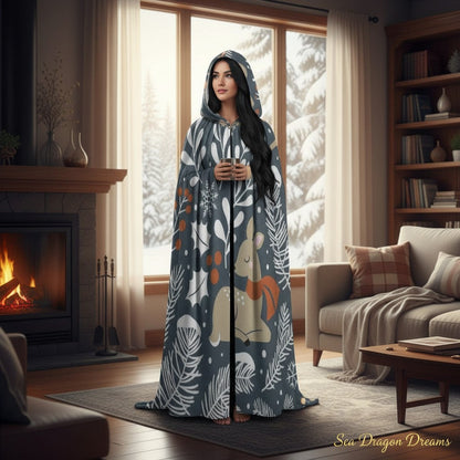 Unisex hooded cloak with dark blue woodland print, long cape silhouette