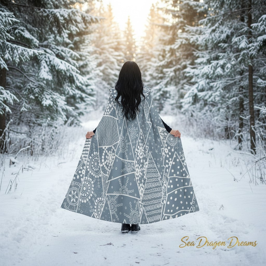 Hooded cape cloak with snowflake and circle print, flowy A-line back view