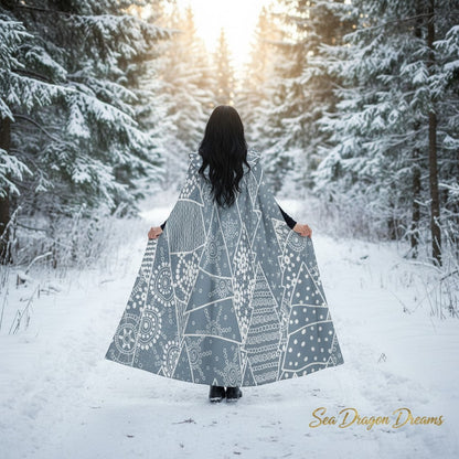 Hooded cape cloak with snowflake and circle print, flowy A-line back view