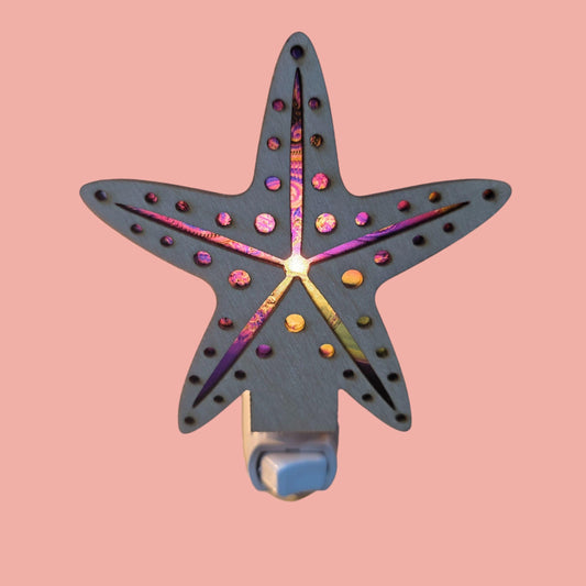 Starfish-shaped LED nightlight in blue with multicolor dots and gold center